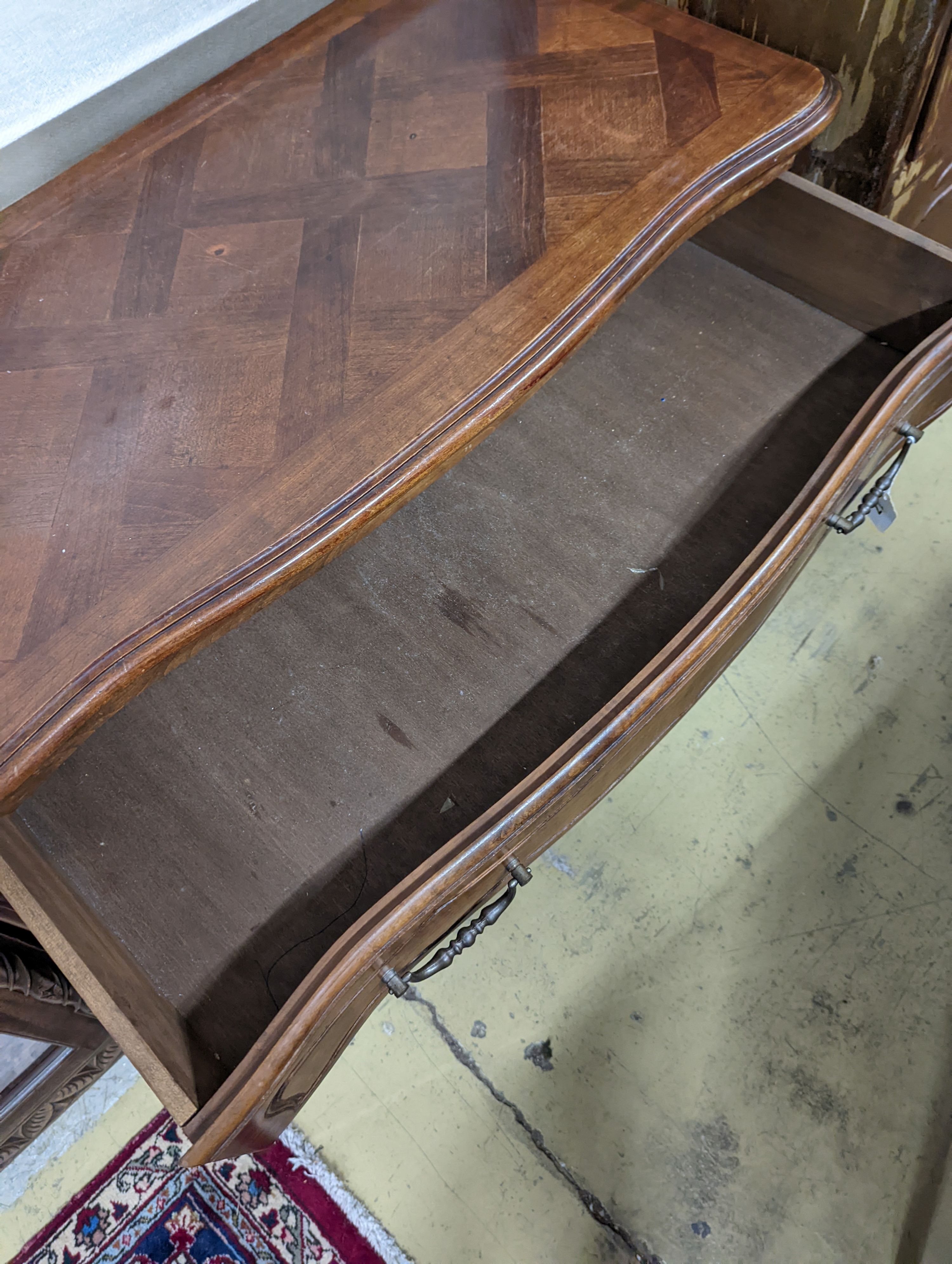 A Louis XV style walnut commode, fitted three long drawers. W-100cm, D-51cm, H-84cm.